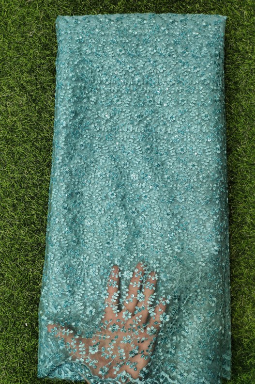 Turquoise Net Fabric With Net Wok